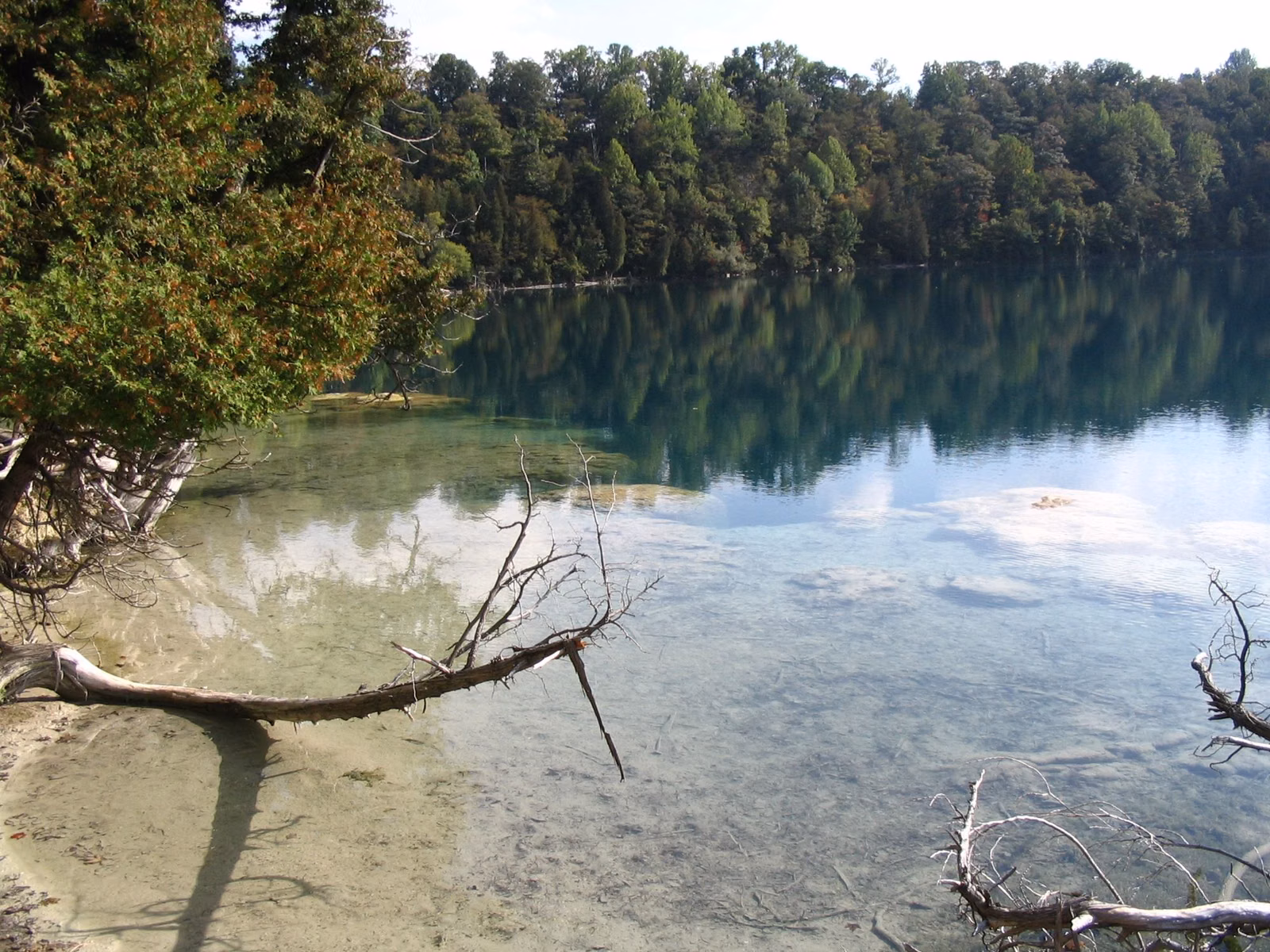 Turquoise water of Green Lake along a wooded shoreline, Green Lakes State Park